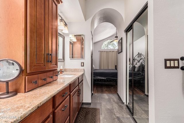 ensuite bathroom featuring vanity and ensuite bathroom