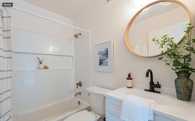 full bathroom featuring vanity, toilet, and tiled shower / bath combo