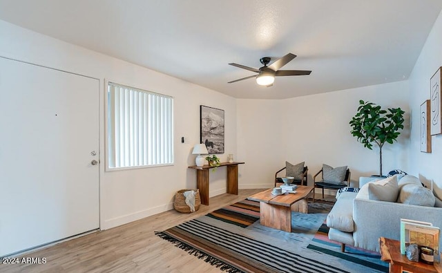 interior space with light hardwood / wood-style floors and ceiling fan