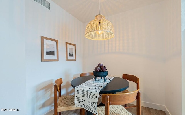 dining area featuring hardwood / wood-style floors