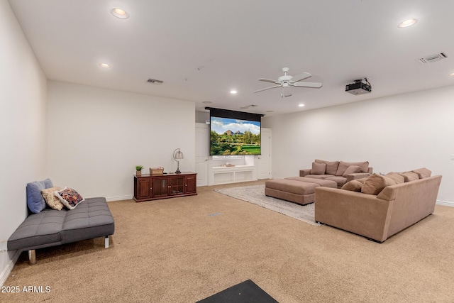 living room with light carpet, visible vents, and recessed lighting