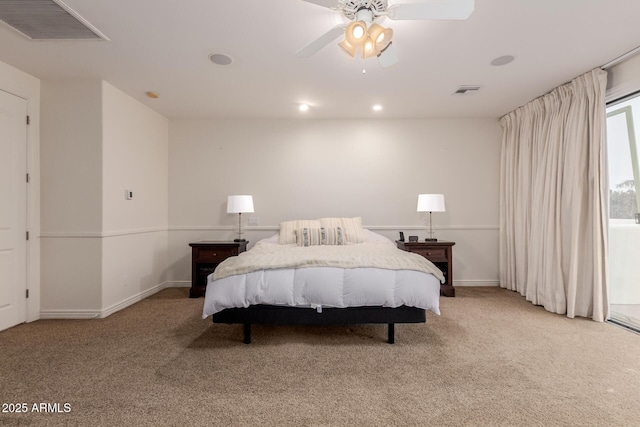 carpeted bedroom with access to exterior, visible vents, ceiling fan, and baseboards