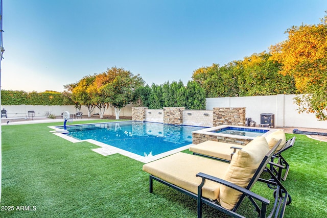 view of swimming pool featuring a fenced backyard, a fenced in pool, and a yard