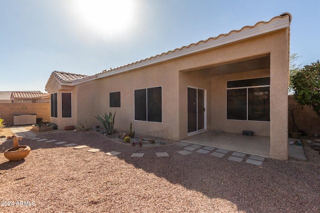 rear view of house featuring a patio area