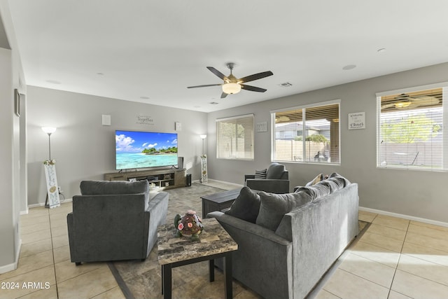 14575 W Orange Dr, Litchfield Park, AZ 85340 - living room featuring light tile patterned floors and ceiling fan