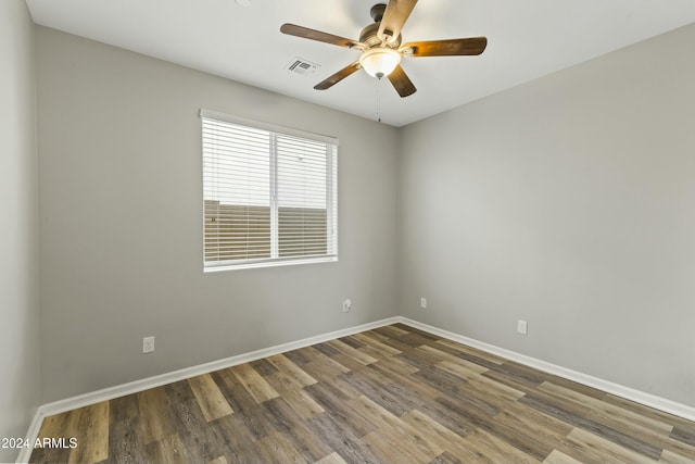 unfurnished room with hardwood / wood-style floors and ceiling fan