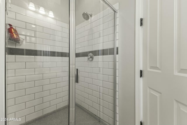 bathroom featuring an enclosed shower