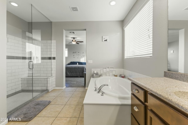 14575 W Orange Dr, Litchfield Park, AZ 85340 - full bath with a shower stall, vanity, a bath, tile patterned flooring, and ceiling fan
