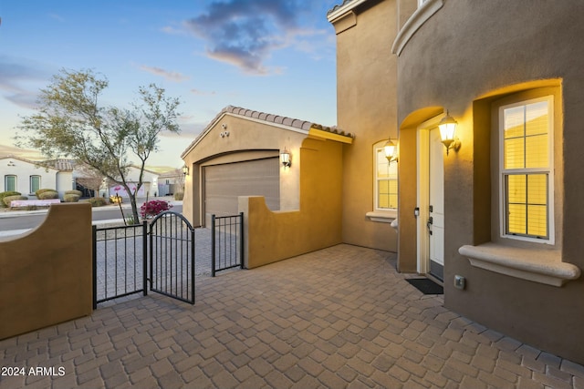 exterior space with a garage and an outdoor structure