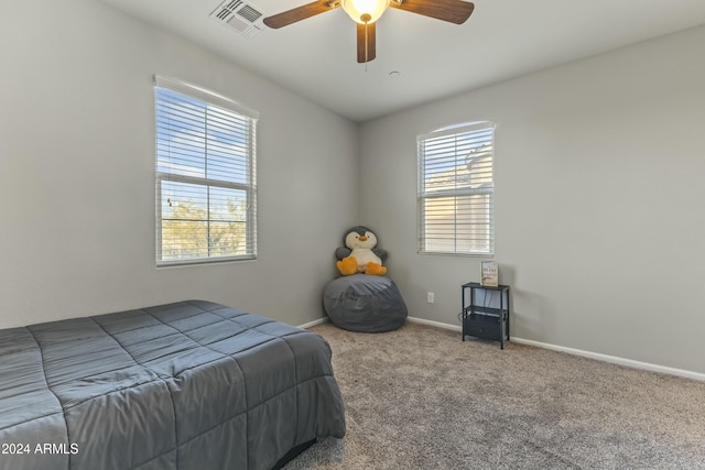 14575 W Orange Dr, Litchfield Park, AZ 85340 - carpeted bedroom featuring baseboards and ceiling fan