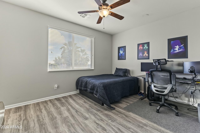 14575 W Orange Dr, Litchfield Park, AZ 85340 - bedroom featuring wood finished floors and a ceiling fan