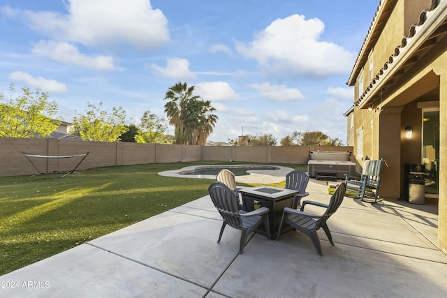14575 W Orange Dr, Litchfield Park, AZ 85340 - fenced backyard featuring a hot tub, a patio area, an outdoor fire pit, and grilling area