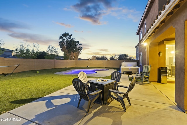 14575 W Orange Dr, Litchfield Park, AZ 85340 - fenced backyard with an outdoor fire pit and a patio area