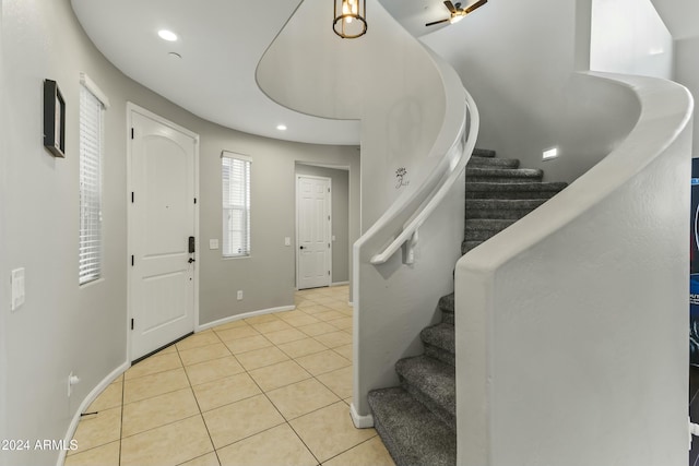 14575 W Orange Dr, Litchfield Park, AZ 85340 - foyer featuring stairway, light tile patterned floors, recessed lighting, and a ceiling fan