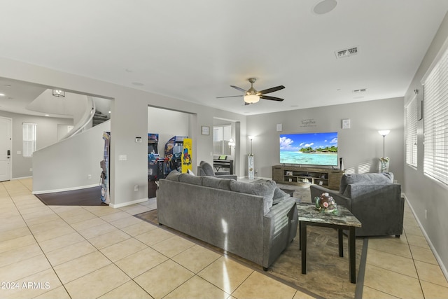 14575 W Orange Dr, Litchfield Park, AZ 85340 - living room featuring light tile patterned floors and ceiling fan