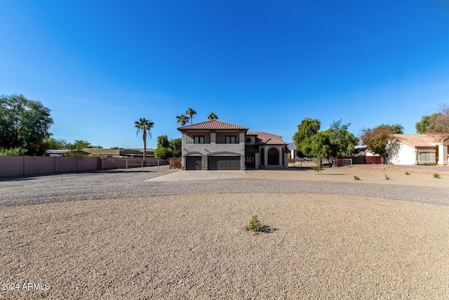 view of front of property featuring a garage