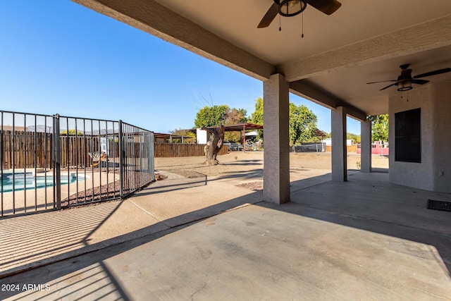 view of patio / terrace featuring ceiling fan and a community pool