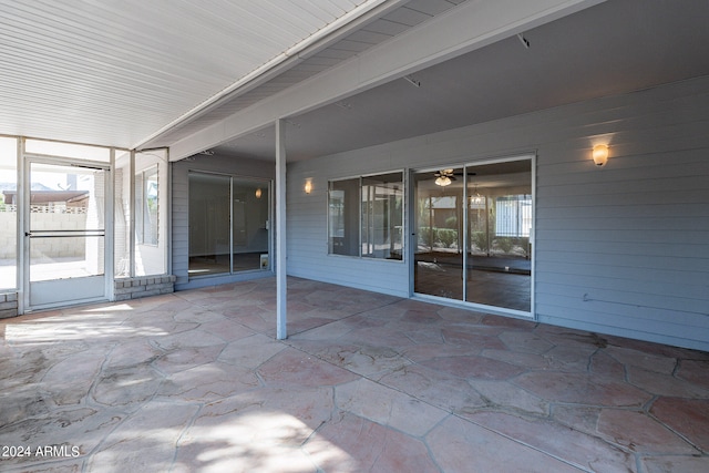 exterior space featuring beamed ceiling