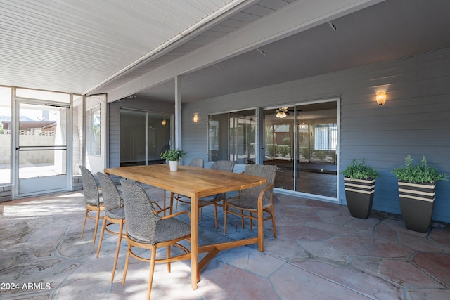 sunroom with beam ceiling