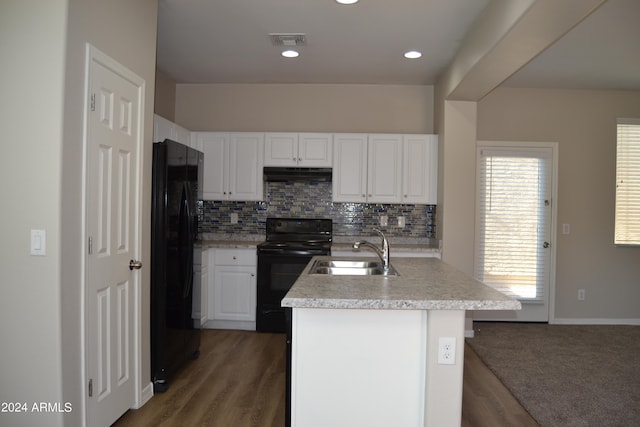 kitchen featuring white cabinetry, dark wood-type flooring, black appliances, tasteful backsplash, and sink