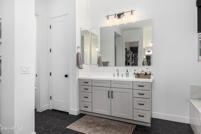 bathroom featuring tile patterned floors and vanity