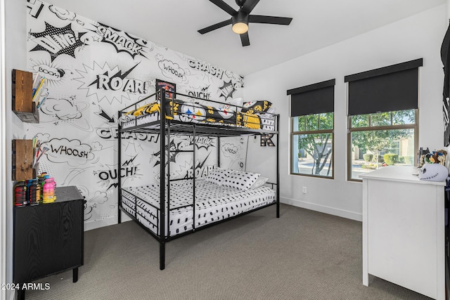 bedroom featuring dark carpet and ceiling fan