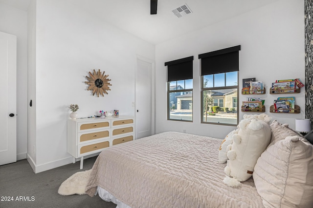 carpeted bedroom with ceiling fan