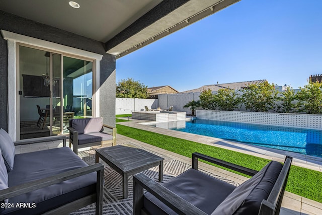 view of patio with a fenced in pool and an outdoor hangout area