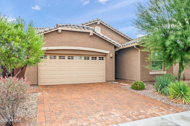 view of front of home featuring a garage