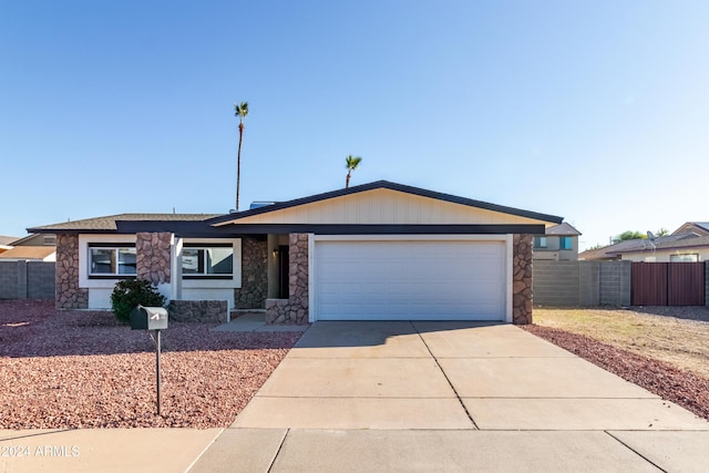 ranch-style home with a garage