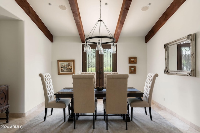 dining room featuring beam ceiling, tile patterned floors, a notable chandelier, and plenty of natural light