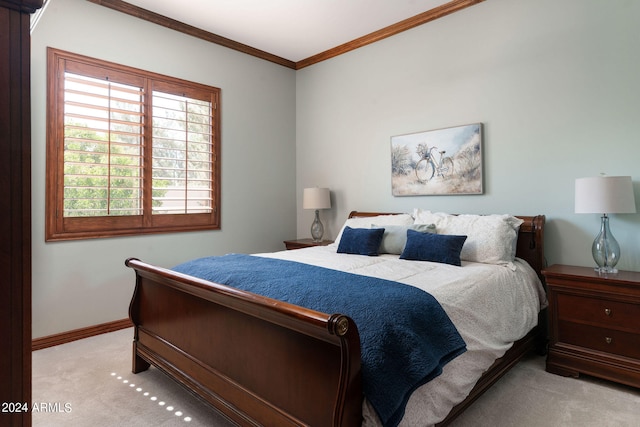 carpeted bedroom with crown molding