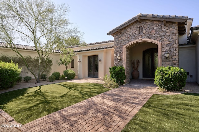 exterior space featuring a front lawn