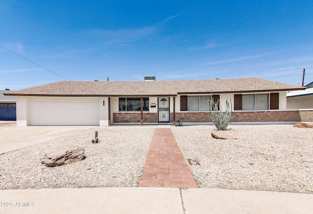 3556 W Augusta Ave, Phoenix, AZ 85051 - ranch-style house with a garage, brick siding, and concrete driveway
