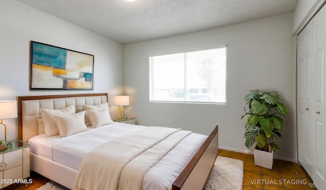3556 W Augusta Ave, Phoenix, AZ 85051 - bedroom featuring a closet and baseboards