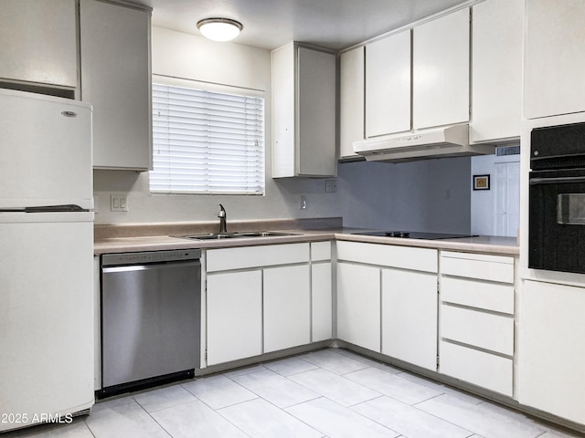 3556 W Augusta Ave, Phoenix, AZ 85051 - kitchen with black appliances, under cabinet range hood, a sink, and white cabinets