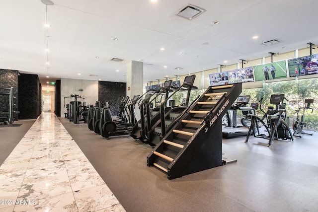 workout area with expansive windows