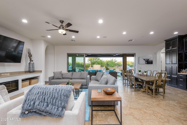 35443 N 87th Pl, Scottsdale, AZ 85266 - living area featuring arched walkways, recessed lighting, and ceiling fan