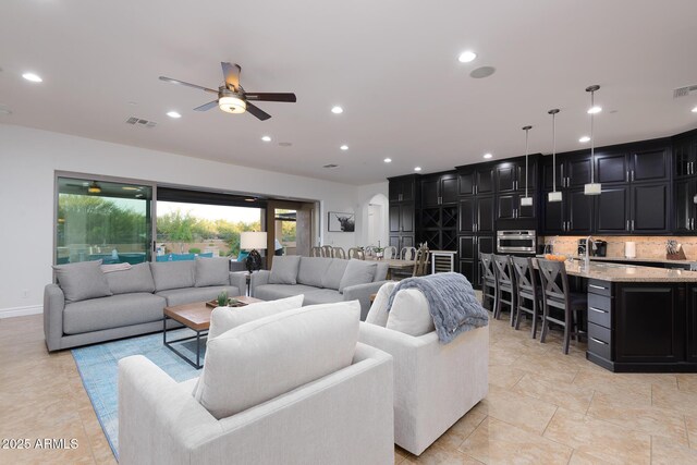 35443 N 87th Pl, Scottsdale, AZ 85266 - living area with a ceiling fan, recessed lighting, and baseboards