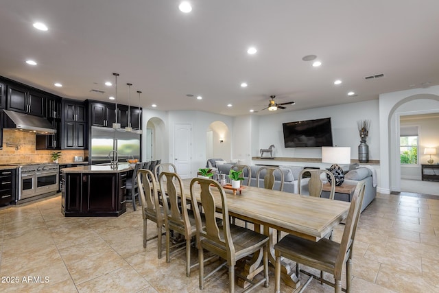 35443 N 87th Pl, Scottsdale, AZ 85266 - dining room featuring arched walkways, ceiling fan, and recessed lighting