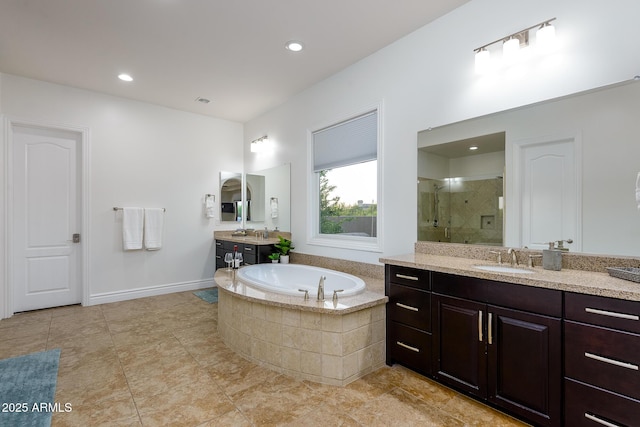 35443 N 87th Pl, Scottsdale, AZ 85266 - full bathroom with a stall shower, a bath, two vanities, tile patterned floors, and recessed lighting
