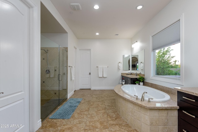 35443 N 87th Pl, Scottsdale, AZ 85266 - bathroom featuring vanity, a shower stall, a garden tub, and recessed lighting