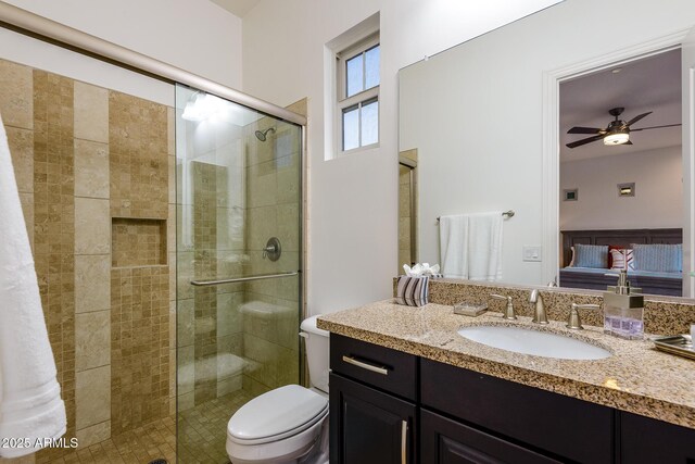 35443 N 87th Pl, Scottsdale, AZ 85266 - full bathroom with vanity, a stall shower, toilet, ensuite bath, and a ceiling fan