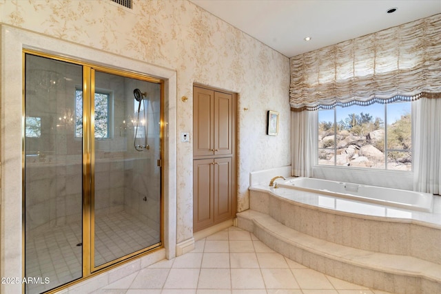 bathroom featuring tile patterned floors and plus walk in shower