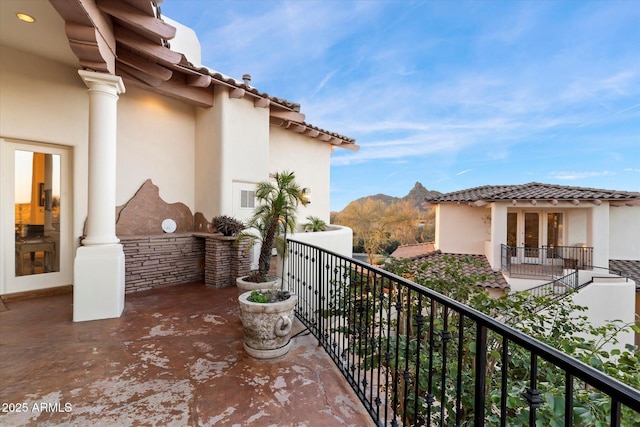 balcony featuring a mountain view