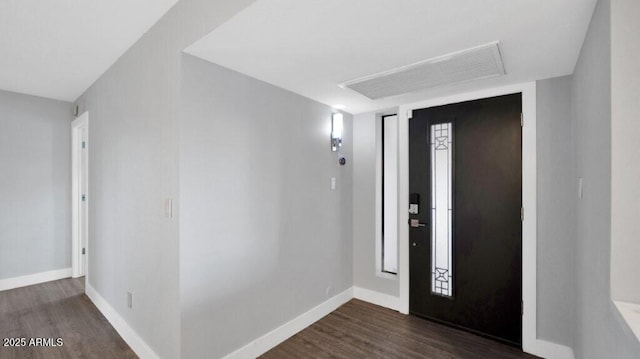 foyer featuring dark wood-type flooring