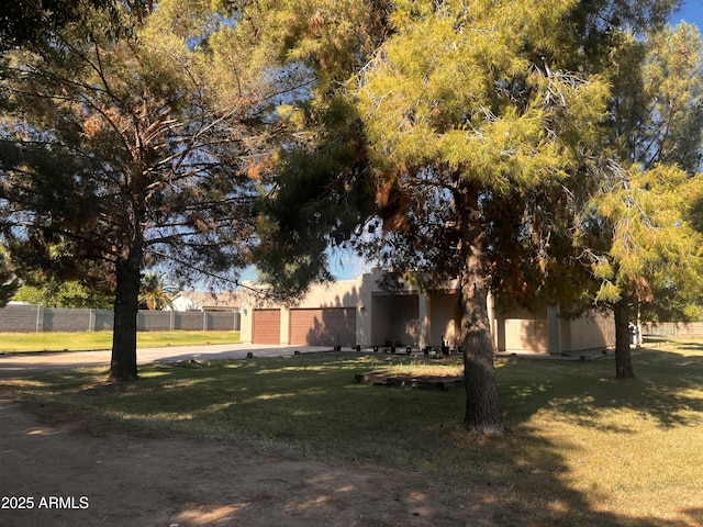 25722 S 179th St, Queen Creek, AZ 85142 - view of front of home featuring driveway, a garage, and stucco siding