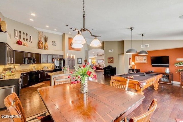 dining area with billiards, dark hardwood / wood-style flooring, and high vaulted ceiling