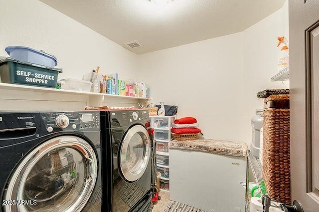 washroom featuring separate washer and dryer