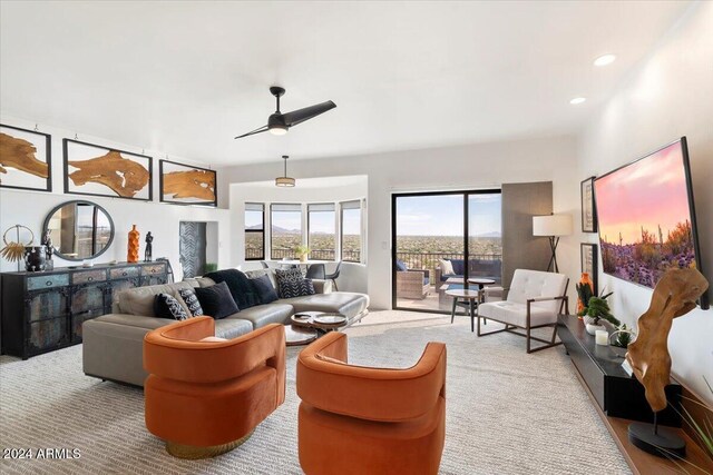 living room featuring ceiling fan